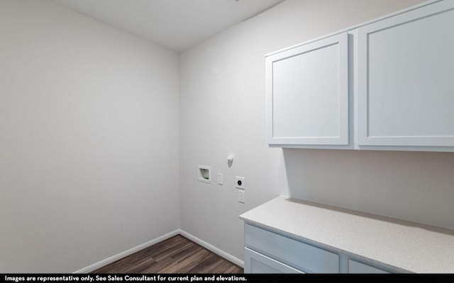 laundry room with baseboards, dark wood finished floors, hookup for a washing machine, cabinet space, and hookup for an electric dryer