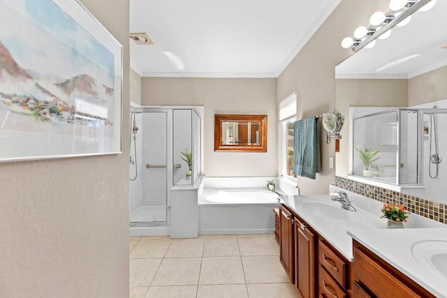 bathroom with tile patterned flooring, a shower stall, and crown molding