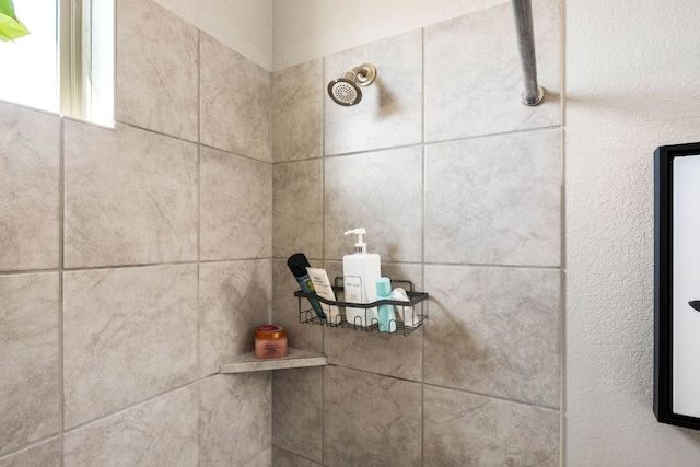 details featuring a tile shower