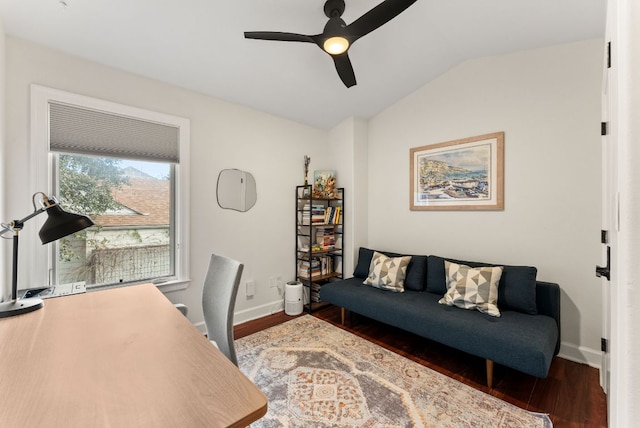 office with baseboards, wood finished floors, a ceiling fan, and vaulted ceiling