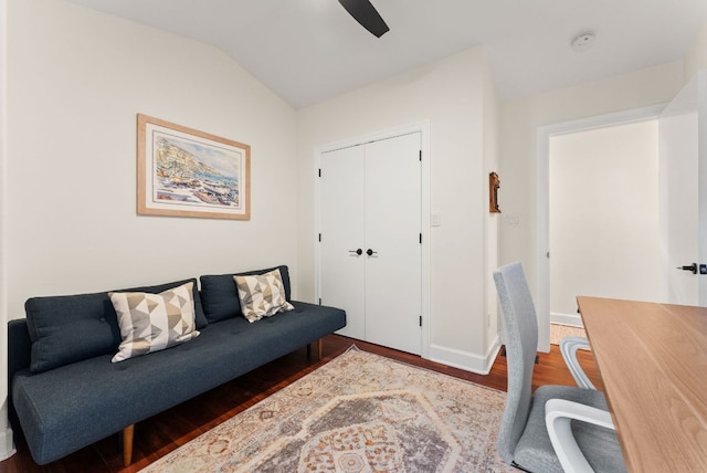 office with baseboards, wood finished floors, ceiling fan, and vaulted ceiling