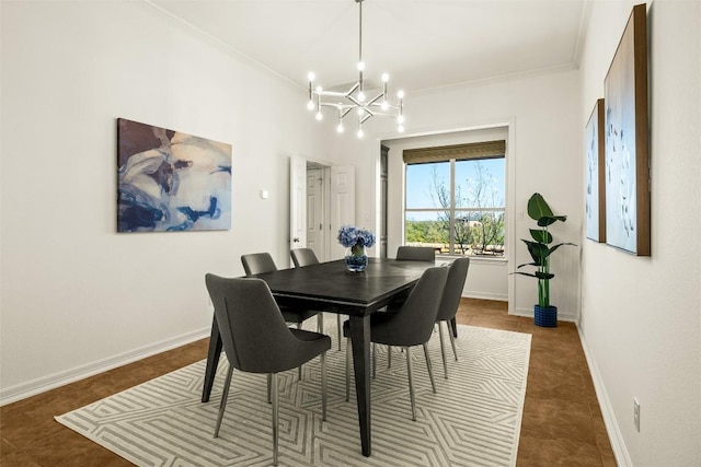 dining area with tile patterned flooring, a notable chandelier, crown molding, and baseboards