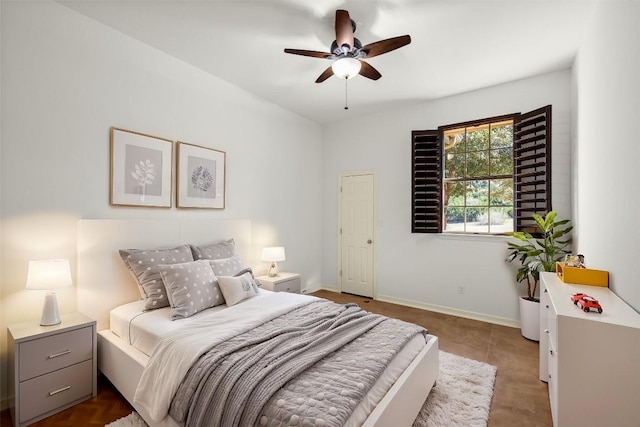 bedroom with baseboards and ceiling fan