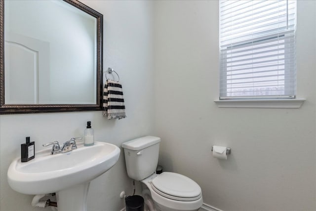 bathroom with a sink and toilet