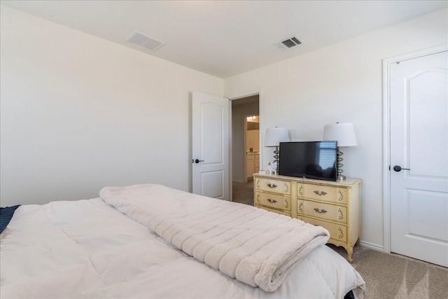 bedroom with light carpet and visible vents