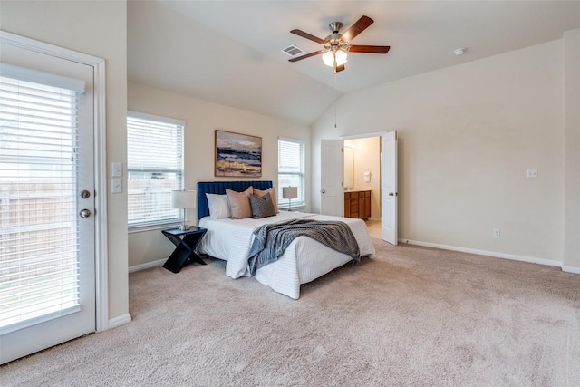 bedroom with baseboards, multiple windows, lofted ceiling, and carpet flooring