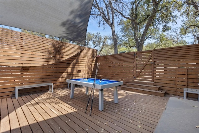 wooden deck featuring fence