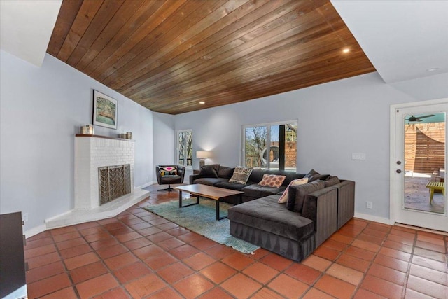 tiled living room featuring recessed lighting, baseboards, wooden ceiling, and a fireplace