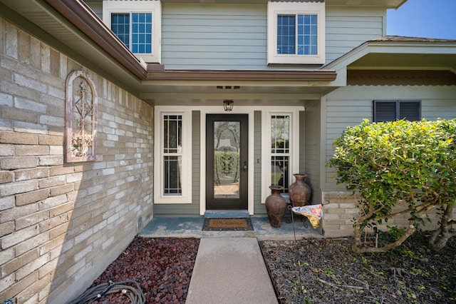 1807 Morning Quail Dr, Austin, TX 78758 - view of exterior entry featuring covered porch