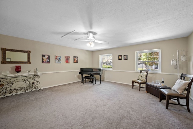 1807 Morning Quail Dr, Austin, TX 78758 - sitting room featuring carpet, ceiling fan, a textured ceiling, and baseboards
