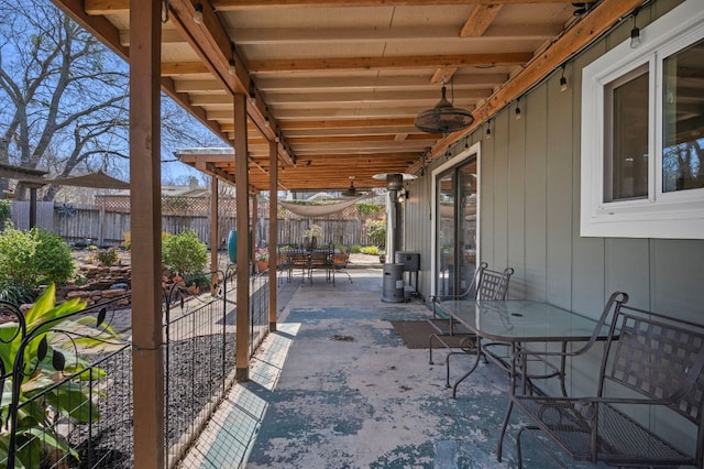 1807 Morning Quail Dr, Austin, TX 78758 - fenced backyard with outdoor dining area and a patio