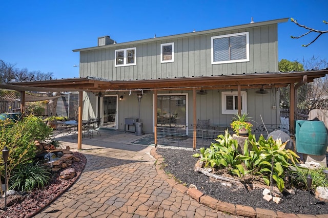 1807 Morning Quail Dr, Austin, TX 78758 - back of house with a patio area, a chimney, and ceiling fan