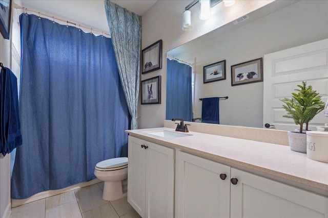 bathroom with tile patterned flooring, visible vents, toilet, a shower with shower curtain, and vanity