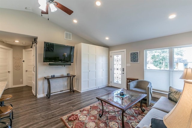 living area with vaulted ceiling, a ceiling fan, dark wood-type flooring, visible vents, and recessed lighting