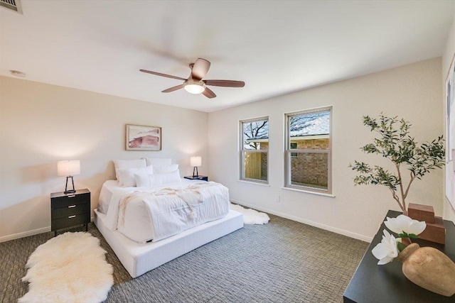 bedroom with visible vents, a ceiling fan, carpet, and baseboards