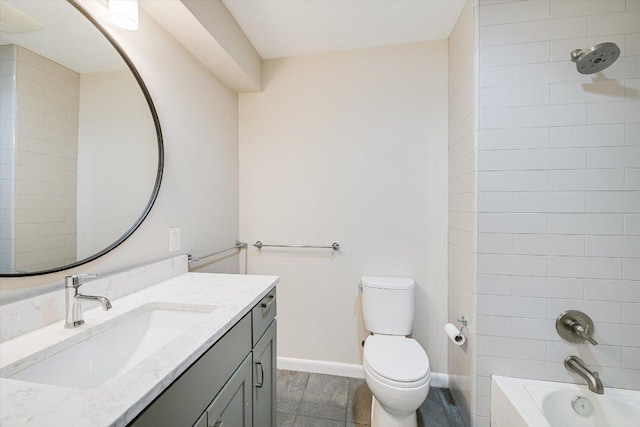 full bath with vanity, toilet, baseboards, and shower / washtub combination