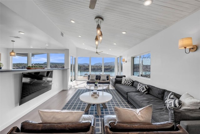 living room featuring a ceiling fan, wood finished floors, visible vents, lofted ceiling, and wooden ceiling