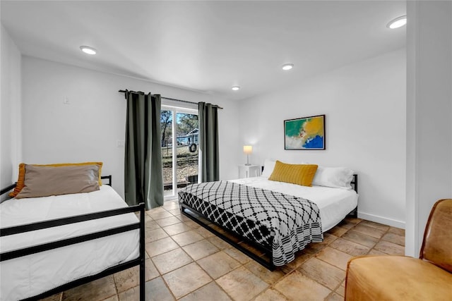 bedroom featuring recessed lighting, baseboards, and access to exterior