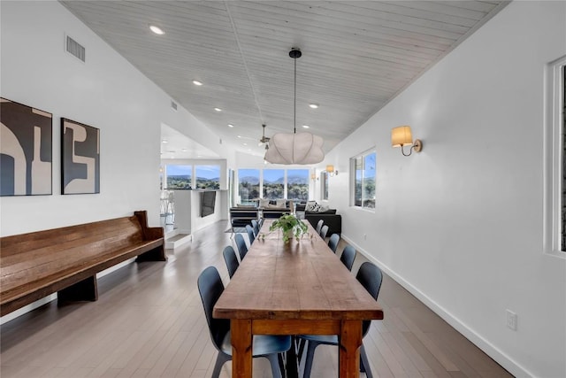 dining space featuring visible vents, recessed lighting, baseboards, and hardwood / wood-style floors