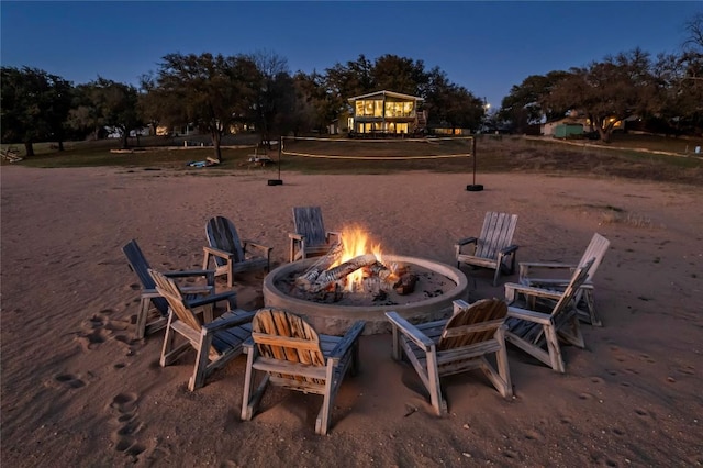 view of patio with a fire pit