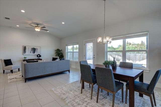 dining space with visible vents, ceiling fan with notable chandelier, recessed lighting, light tile patterned flooring, and lofted ceiling