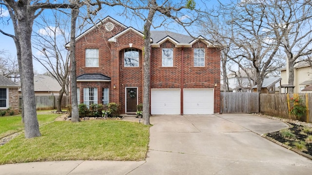 traditional home with brick siding, driveway, a front lawn, and fence