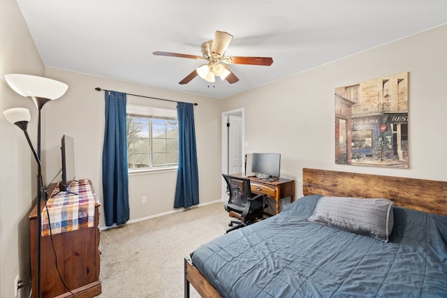 bedroom with carpet flooring, a ceiling fan, and baseboards