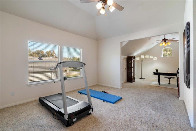 workout room with baseboards, carpet floors, a ceiling fan, and vaulted ceiling