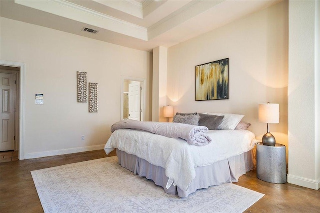 bedroom with visible vents, crown molding, a raised ceiling, and baseboards