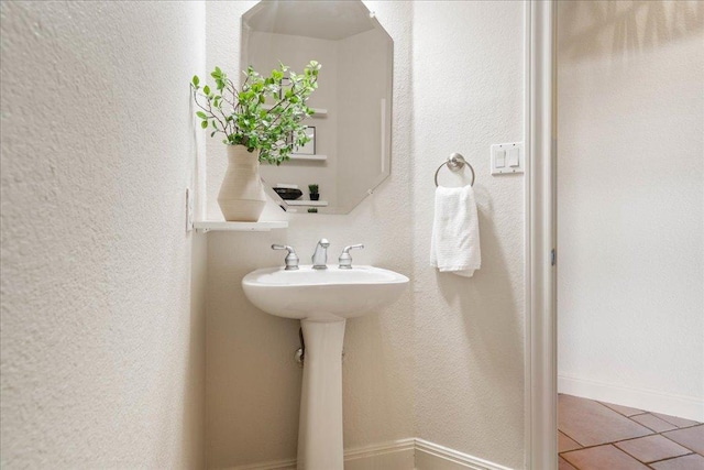 bathroom featuring tile patterned flooring