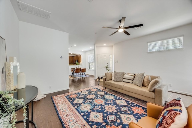 living room featuring visible vents, a ceiling fan, wood finished floors, recessed lighting, and baseboards