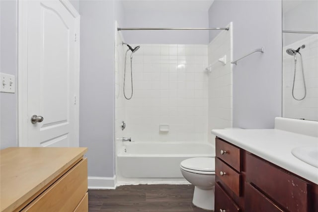 full bathroom with vanity, shower / bathing tub combination, toilet, and wood finished floors