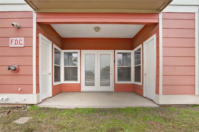 doorway to property with a patio