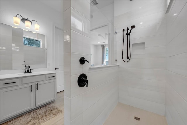 full bath featuring a walk in shower and visible vents