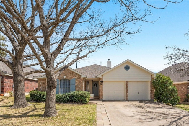 ranch-style house featuring a front lawn, roof with shingles, concrete driveway, an attached garage, and brick siding