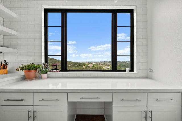 interior space featuring decorative backsplash