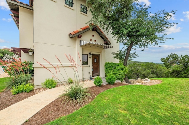 223 Honey Creek Ct Unit 12, Lakeway, TX 78738 - mediterranean / spanish house with a front yard and stucco siding
