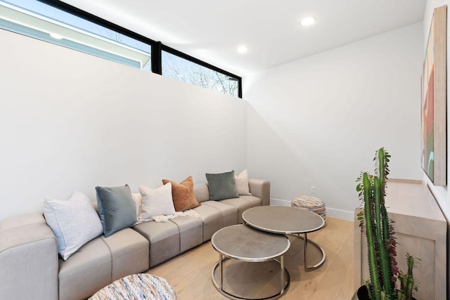 5514 Montview St, Austin, TX 78756 - living room with recessed lighting, light wood-style floors, and baseboards