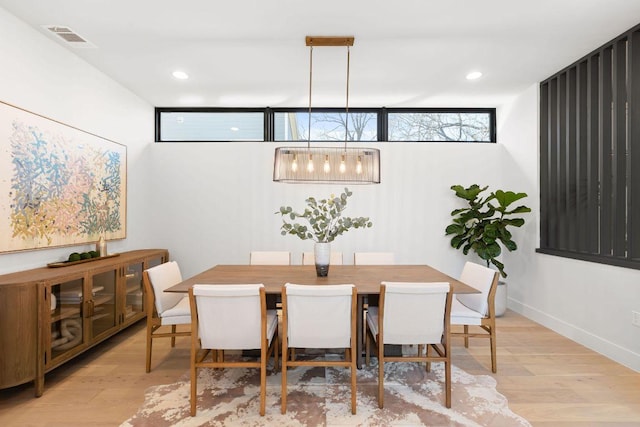 dining space with visible vents, recessed lighting, light wood-type flooring, and baseboards