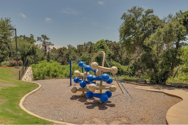 community play area with a yard