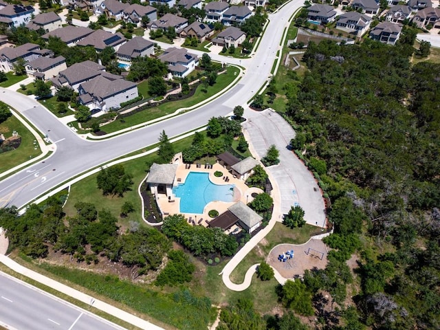 birds eye view of property with a residential view