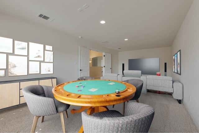 recreation room featuring carpet flooring, recessed lighting, and visible vents