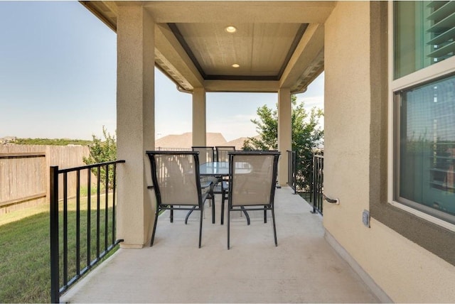 balcony with outdoor dining area