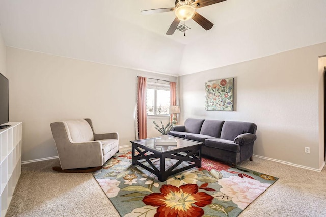 carpeted living area with vaulted ceiling, a ceiling fan, baseboards, and visible vents