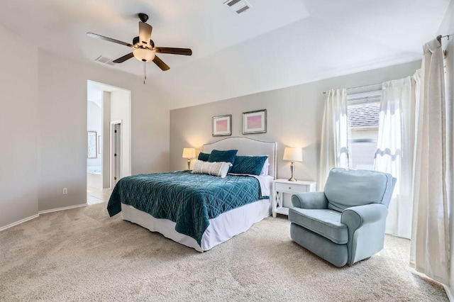 bedroom with visible vents, ceiling fan, ensuite bath, and carpet