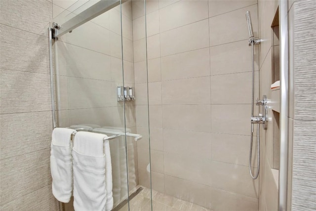 bathroom with a stall shower