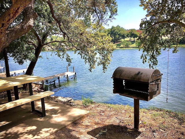 view of dock featuring a water view