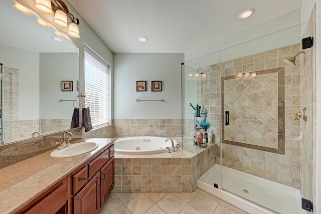 full bathroom with vanity, a stall shower, a whirlpool tub, and tile patterned flooring