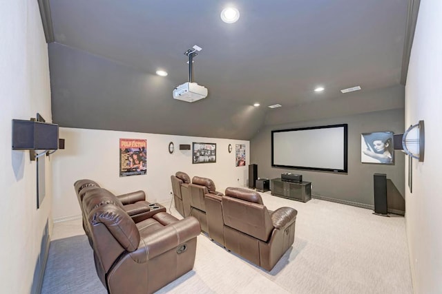 cinema room featuring visible vents, baseboards, lofted ceiling, carpet flooring, and recessed lighting