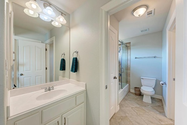 full bathroom featuring visible vents, toilet, vanity, and bathing tub / shower combination